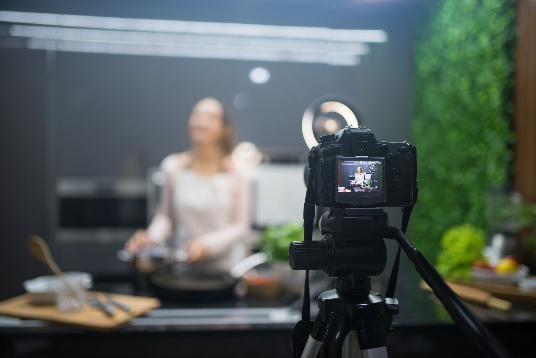 black dslr camera on tripod
